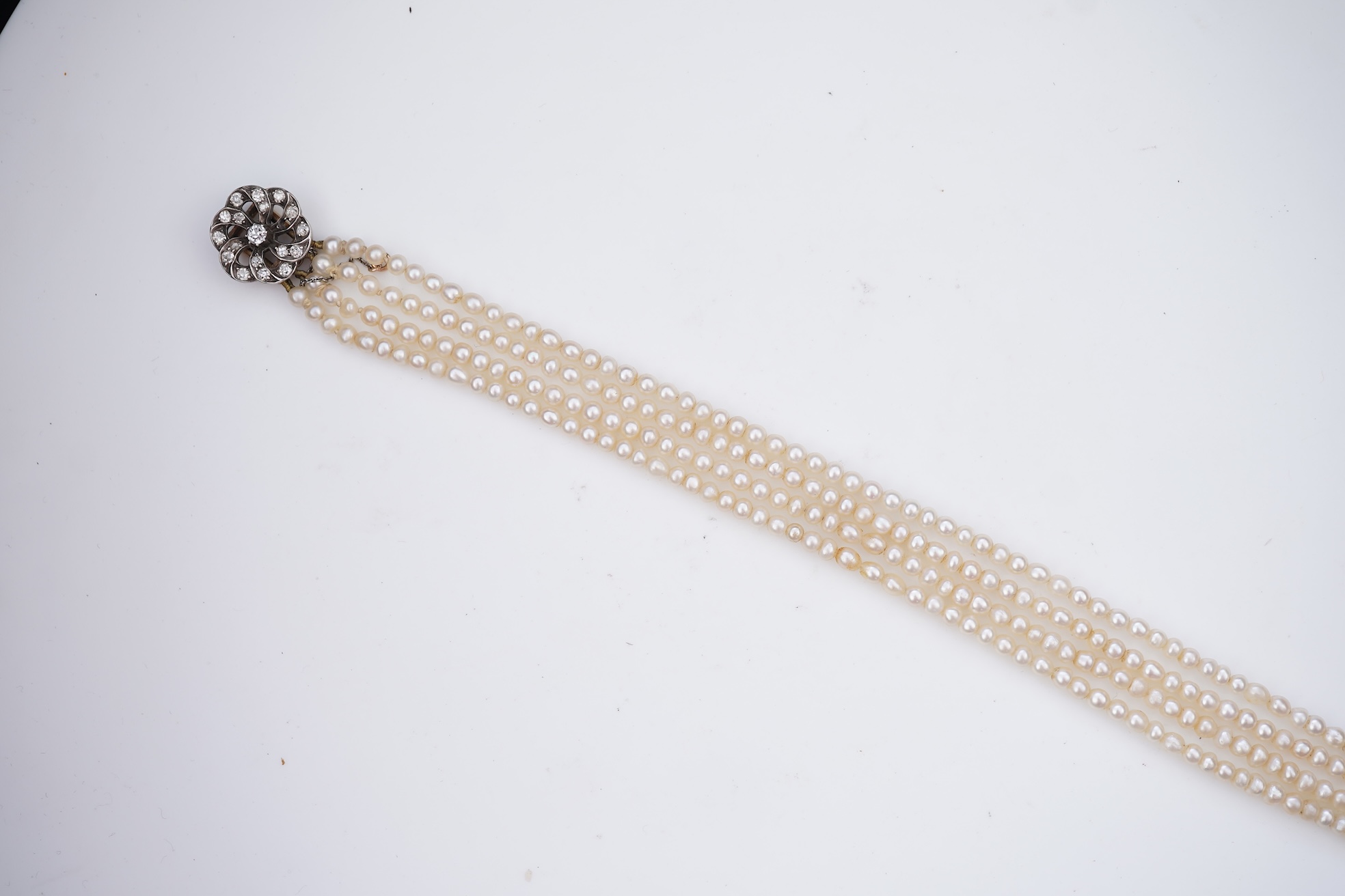 A pearl and diamond necklace, 19th century and later
